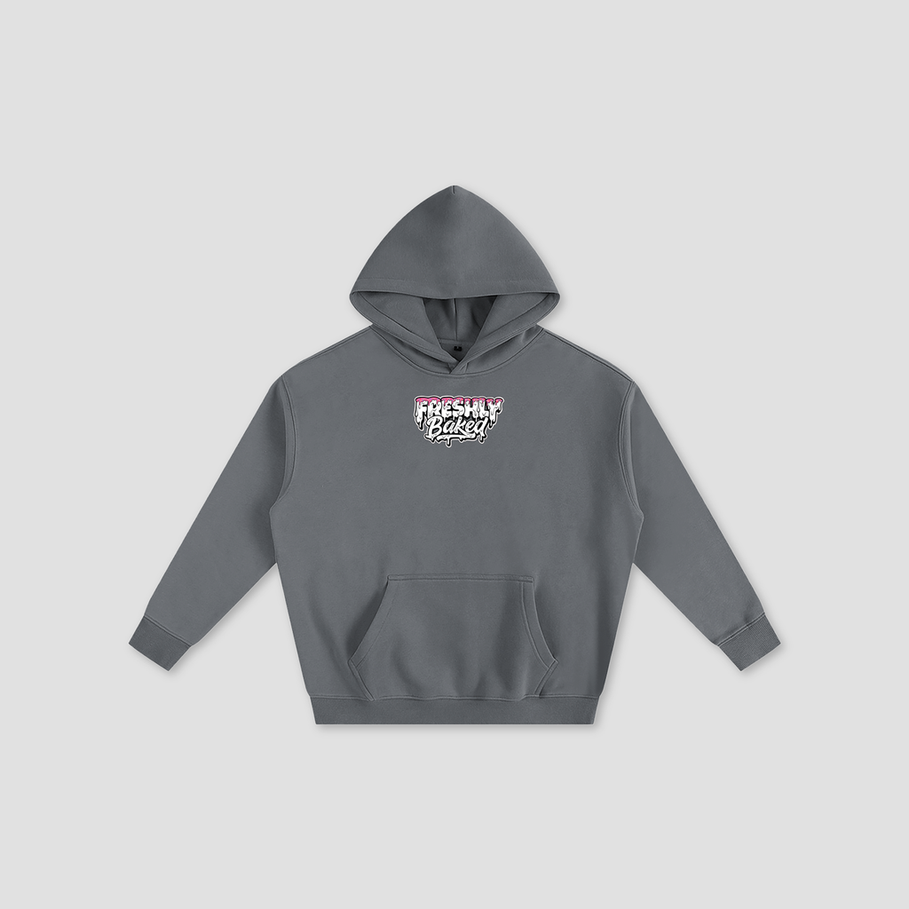 A dark gray pullover hoodie with a front kangaroo pocket and a small graphic on the chest reading 'Freshly Baked' in white, pink, and black, displayed on a light gray background.
