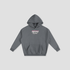 A dark gray pullover hoodie with a front kangaroo pocket and a small graphic on the chest reading 'Freshly Baked' in white, pink, and black, displayed on a light gray background.
