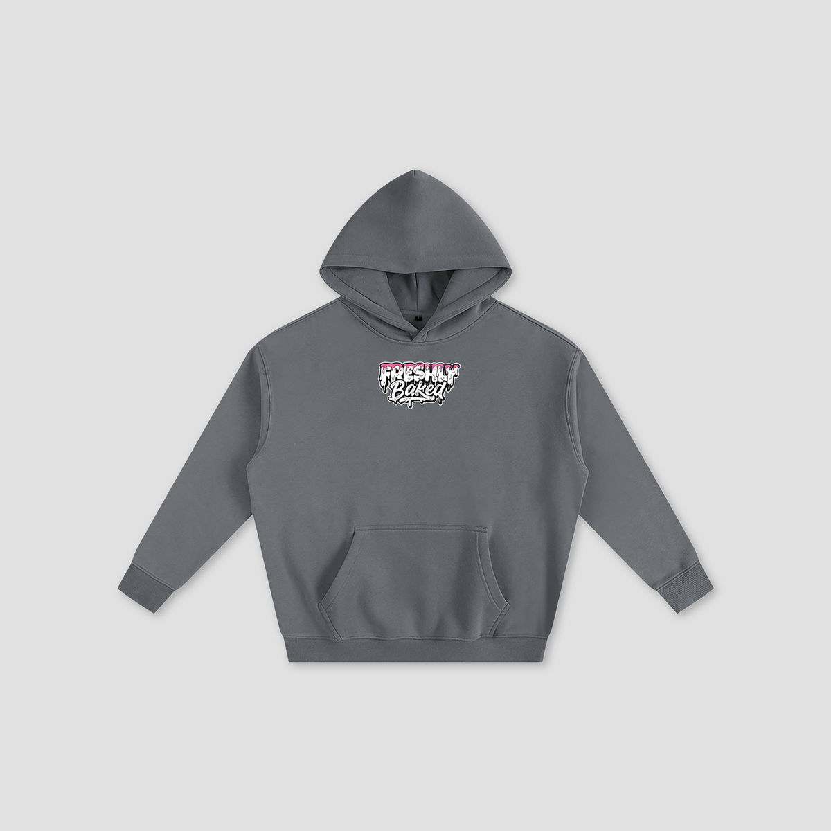 A dark gray pullover hoodie with a front kangaroo pocket and a small graphic on the chest reading 'Freshly Baked' in white, pink, and black, displayed on a light gray background.
