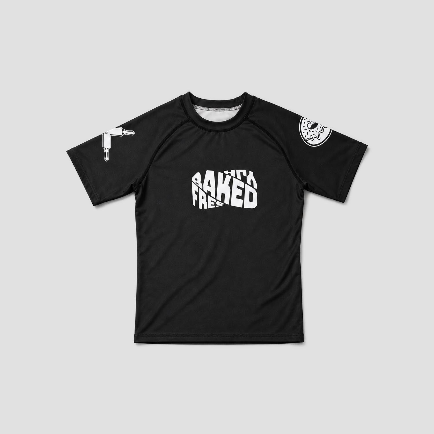 A black short-sleeve athletic t-shirt with a white graphic print on the front reading 'FRESHLY BAKED' and additional white graphics on both sleeves, displayed flat against a light gray background.
