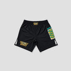 Black athletic shorts with 'FRESHLY BAKED' printed in yellow on the left leg and waistband, featuring a colorful patterned pocket on the right leg, shown on a light gray background.