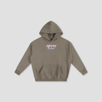 A taupe brown pullover hoodie with a front kangaroo pocket and a small graphic on the chest reading 'FRESHLY BAKED' in pink, white, and black, displayed on a light gray background.
