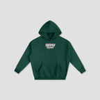 A dark green pullover hoodie with a small graphic on the chest reading 'Freshly Baked' in white, pink, and black, displayed on a light gray background.
