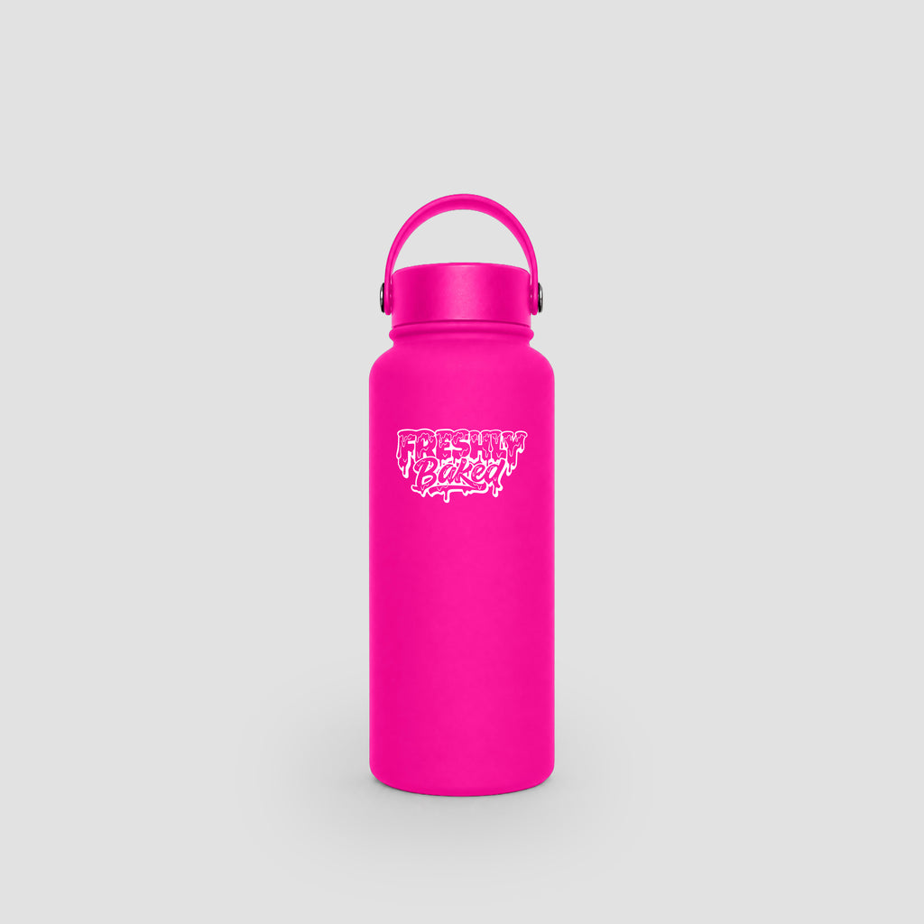 A bright pink insulated water bottle with a matching pink lid and carry loop, featuring a white 'Freshly Baked' logo on the front, set against a solid light gray background.