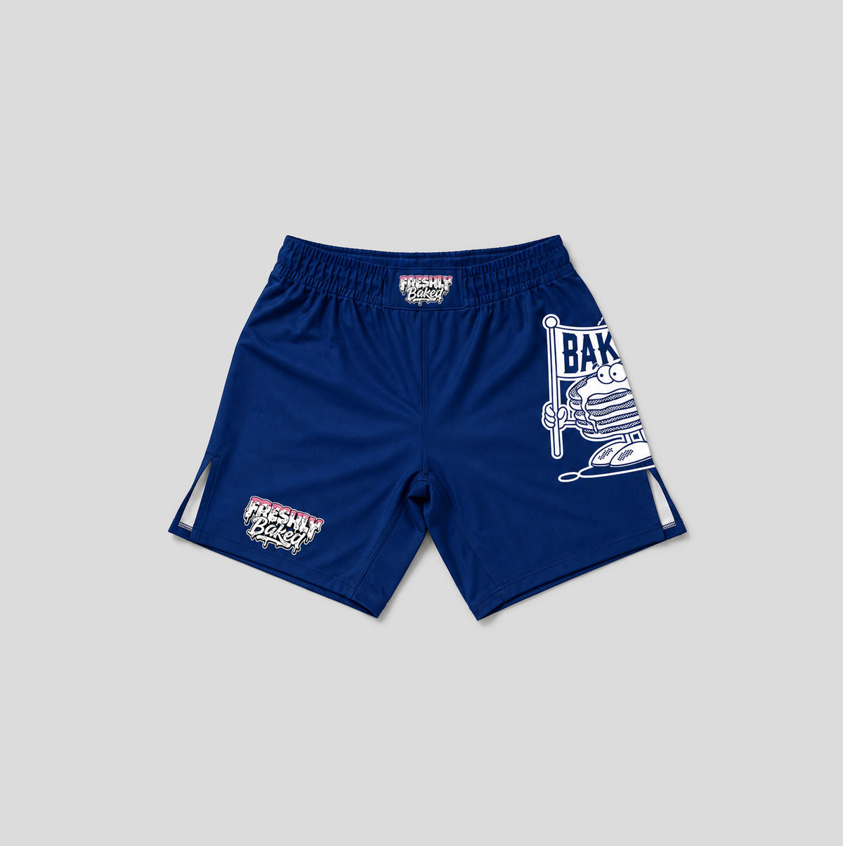 A pair of royal blue athletic shorts with white and red graphic prints, displayed flat against a neutral gray background.