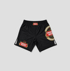 Black athletic shorts featuring 'Freshly Baked' brand graphics, including a large circular logo on the left leg and a smaller rectangular patch on the right leg, displayed against a light gray background.