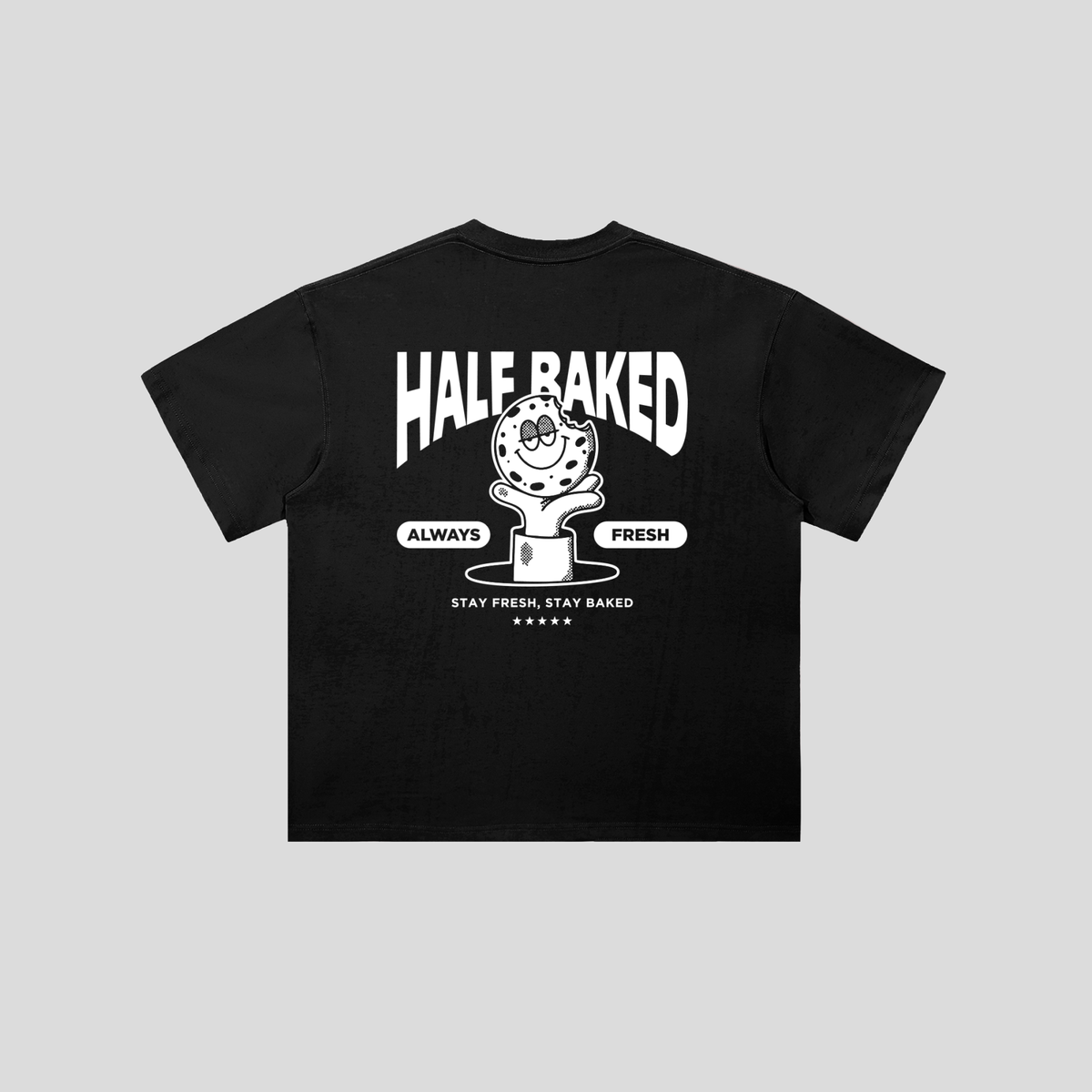 A black short-sleeve t-shirt with a white graphic print on the back. The graphic features the text 'HALE BAKED' in a bold, arched font above an illustration of a donut on a stand, with 'ALWAYS FRESH' and 'STAY FRESH, STAY BAKED' below.