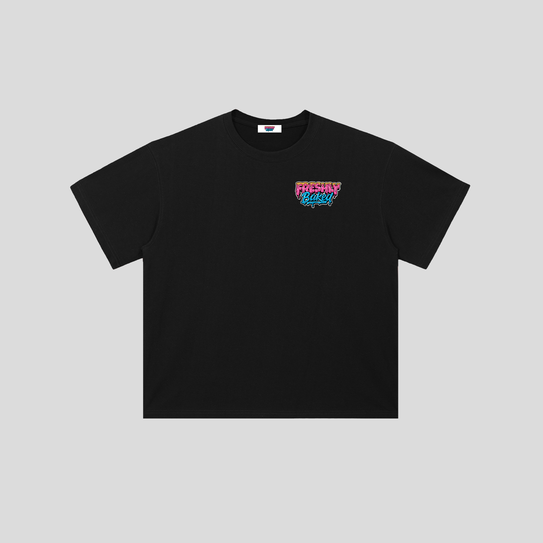 A black short-sleeve crewneck t-shirt with a colorful graphic on the left chest reading 'FRESHLY WASHED' in pink and blue, displayed on a neutral gray background.
