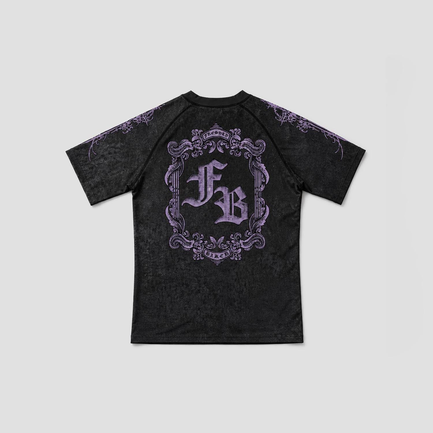A black short-sleeve t-shirt with a distressed texture, featuring a large purple gothic-style monogram 'FB' inside an ornate frame on the back, with purple decorative details on the shoulders, shown against a light gray background.