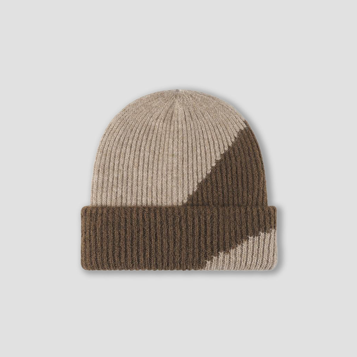 A ribbed knit beanie hat with a geometric color-blocked pattern in beige, brown, and taupe, shown against a light gray background.