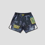 A pair of athletic shorts with a dark gray and white marble pattern, featuring 'FRESHLY BAKED' printed in yellow on the left leg and a yellow and blue patterned patch on the right leg.