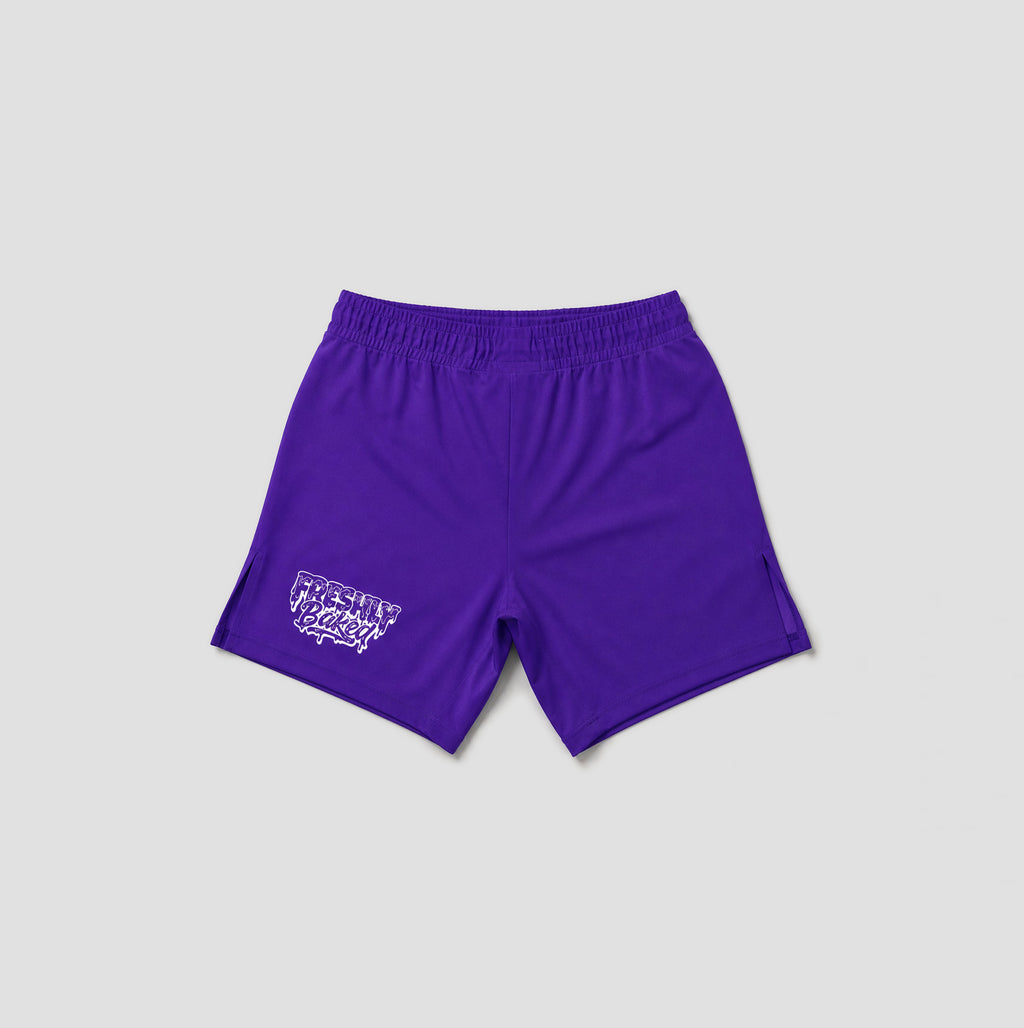 Purple athletic shorts with an elastic waistband and a white graphic logo on the left leg, displayed against a light gray background.