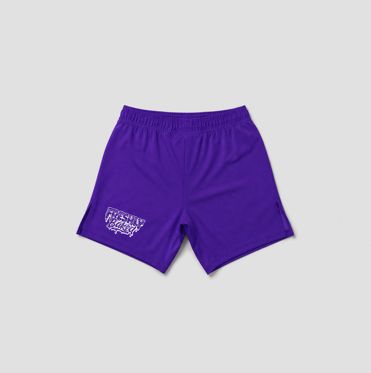 Purple athletic shorts with an elastic waistband and a white graphic logo on the left leg, displayed against a light gray background.
