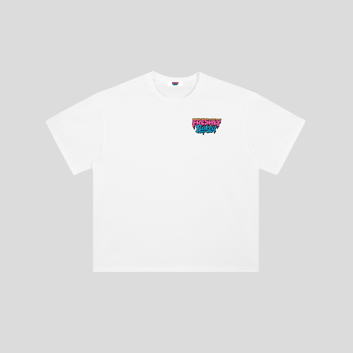 A white short-sleeve crewneck t-shirt with a colorful graphic on the left chest reading 'FRESHLY WASHED' in pink, red, and blue, displayed on a neutral gray background.