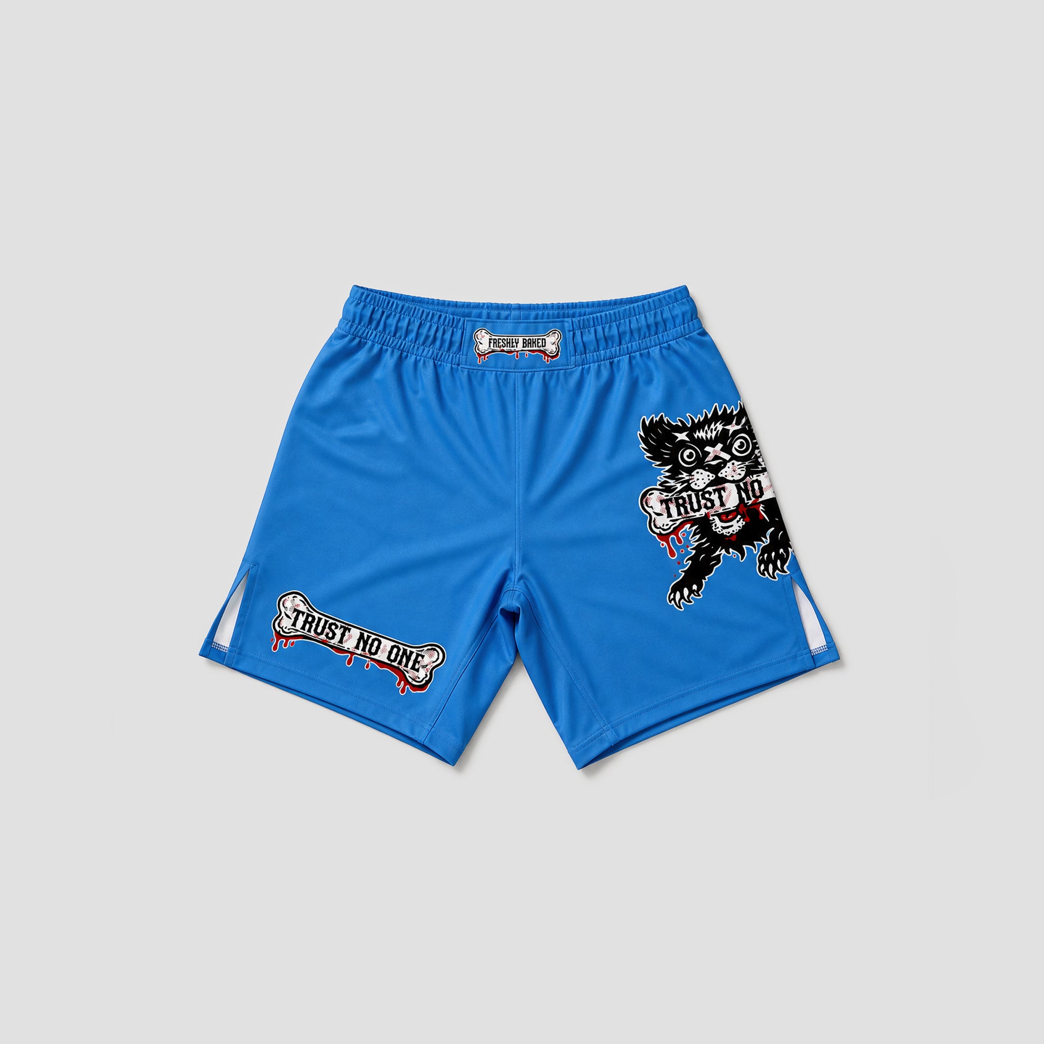 Blue athletic shorts with 'Trust NO ONE' graphics, featuring a black and white cartoon dog on the right leg and a matching graphic on the left leg, shown on a light gray background.