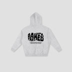 A light heather gray hoodie shown from the back, featuring a bold black graphic print that reads 'FRESHLY BAKED' with smaller text underneath, displayed on a neutral light gray background.