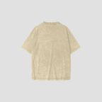 A short-sleeve crewneck t-shirt with a light beige mineral wash texture, shown from the back on a solid light gray background.