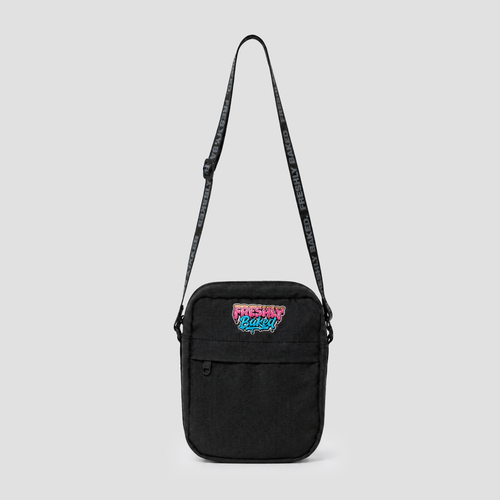 A black canvas crossbody bag with a colorful 'Gotta Go Back' graphic patch on the front pocket and a black patterned shoulder strap, shown against a light gray background.