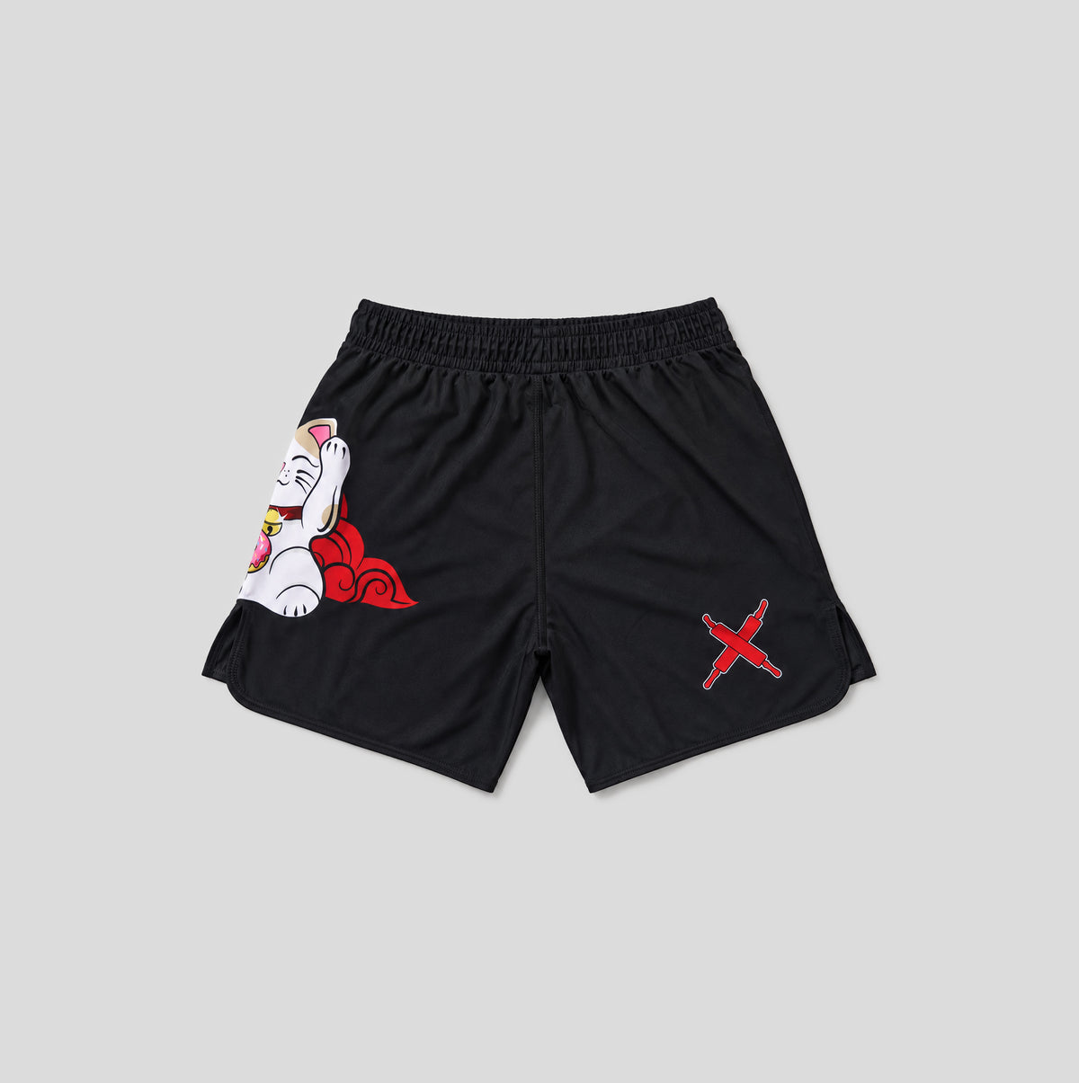 Black athletic shorts featuring a white and red lucky cat graphic on the left leg and a red X logo on the right leg, displayed flat against a light gray background.